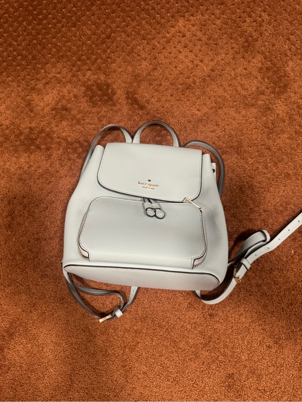 kate spade Pebbled Leather Mini Backpack in Light Gray with Gold Hardware